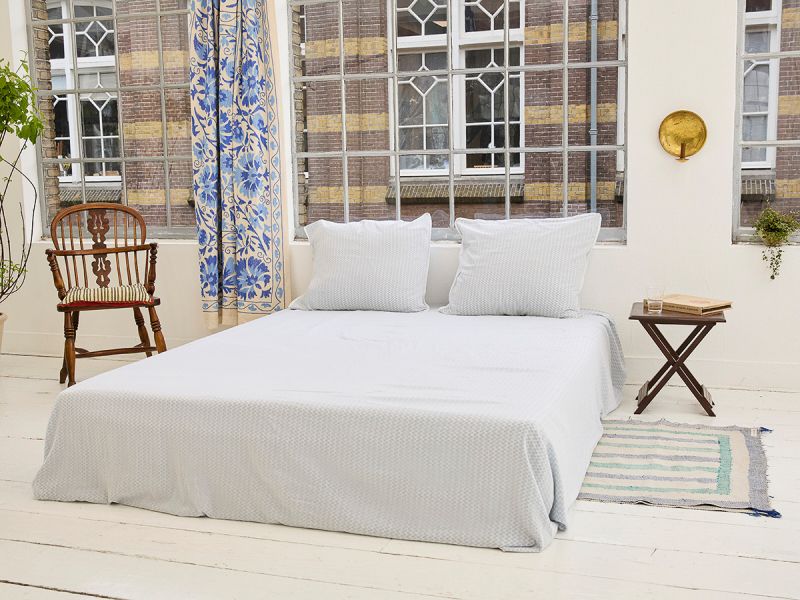 Enjoy the Khasto sleeping experience in the Sheet - Blue Twig. Handmade from thin layers of soft & airy 100% cotton GOTS certified.
